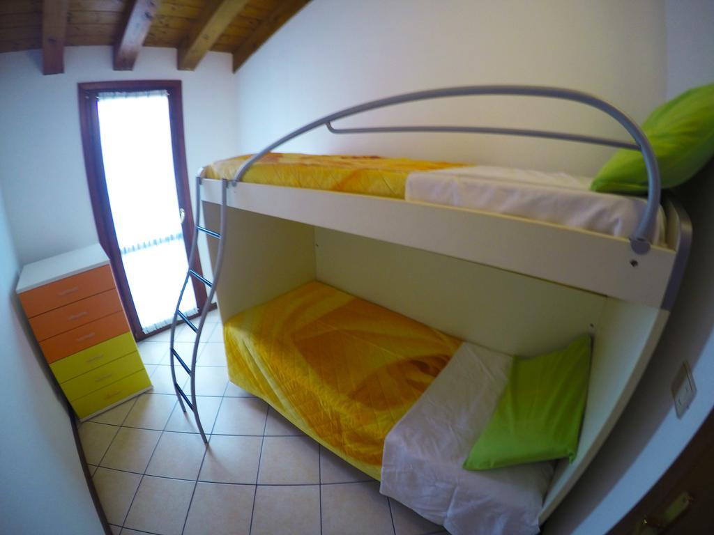 Residence Pineta - Agenzia Cocal Каорле Стая снимка